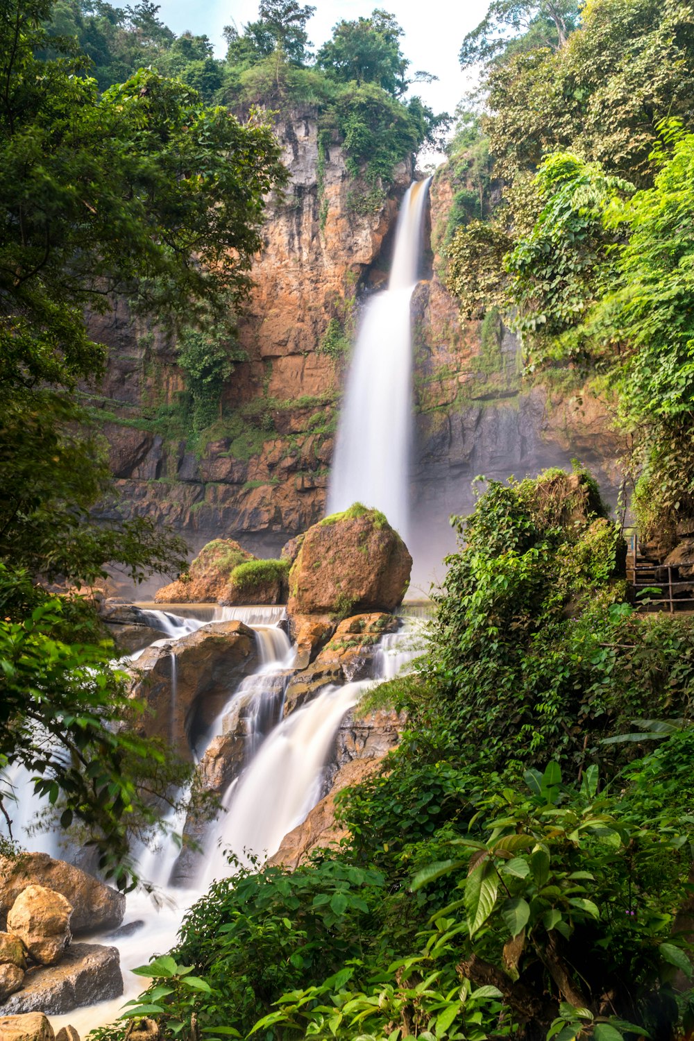 a waterfall in a forest