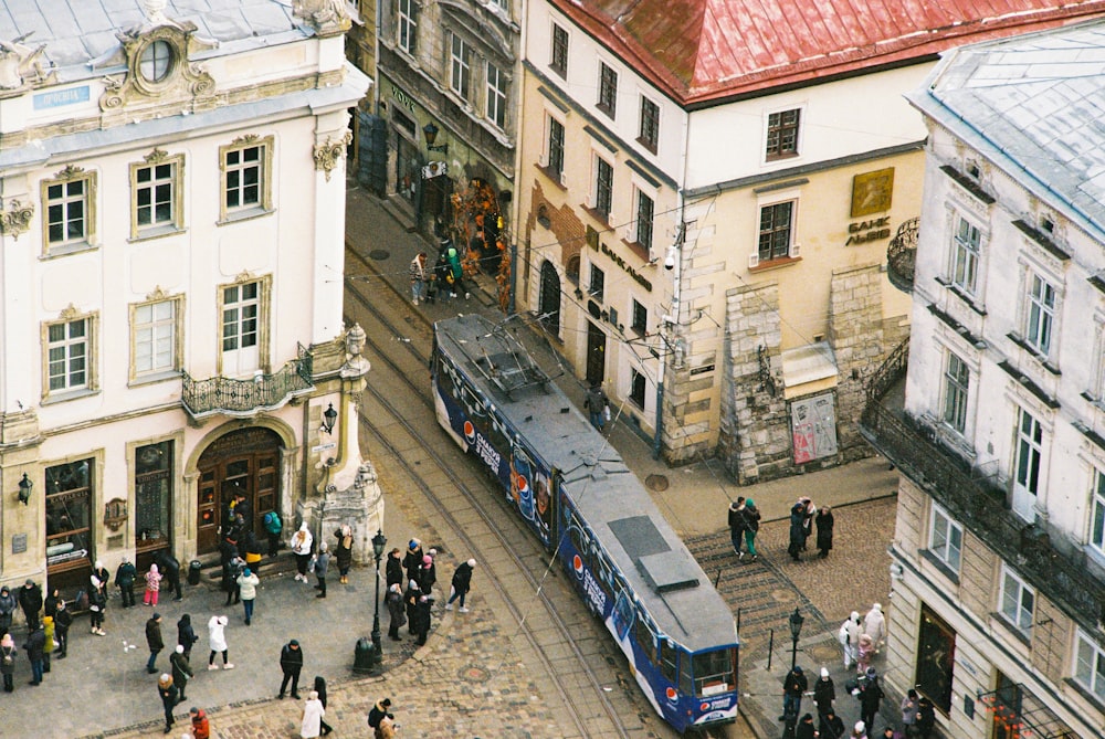 a street with people and buildings