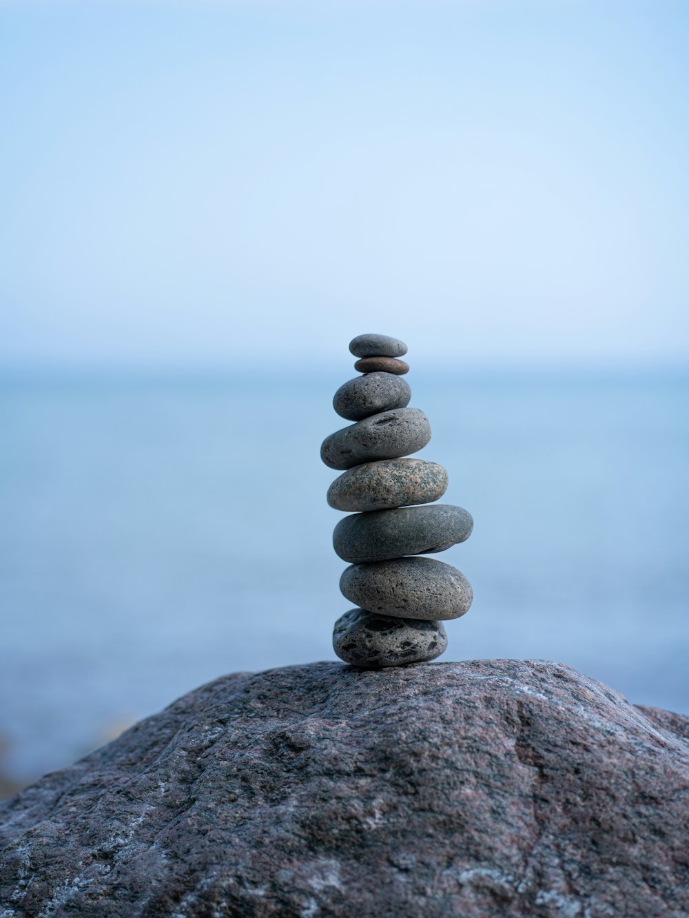 a stack of rocks on a mountain