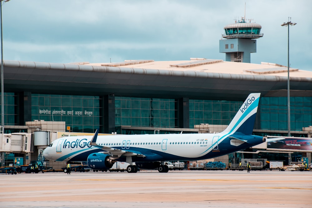 a large airplane is parked at an airport