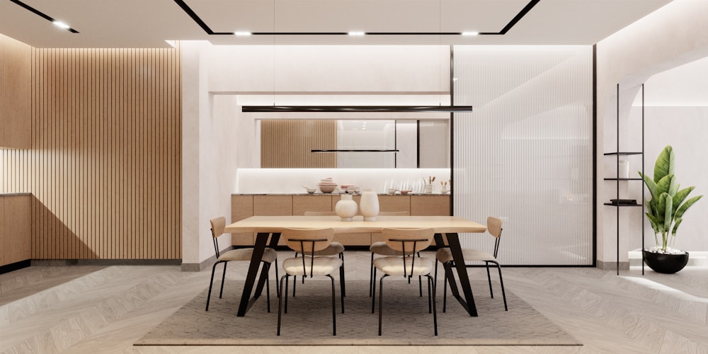 a kitchen with a dining table and chairs