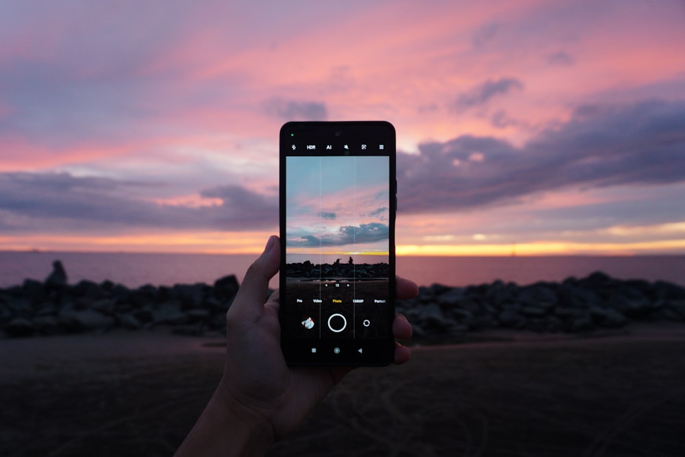 a person holding a cell phone