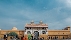 Tourists exploring the historic Al Fahidi Fort museum in Sharjah, immersed in culture.