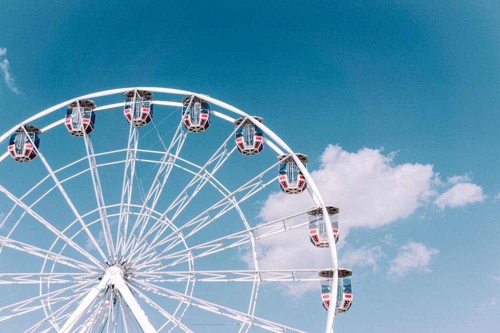 a ferris wheel with blue sky