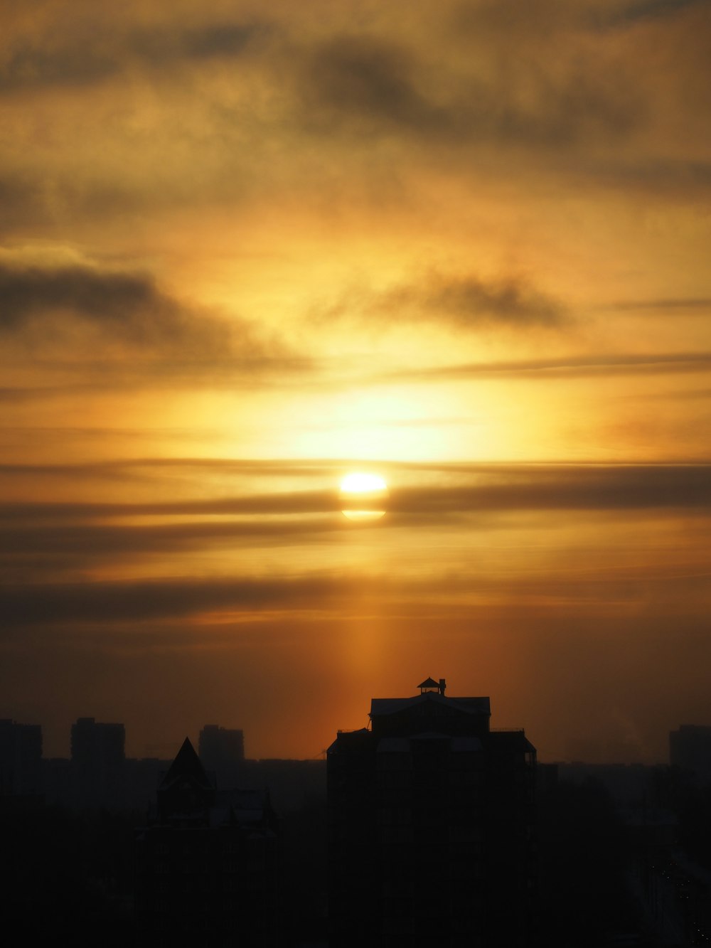 a sunset over a city