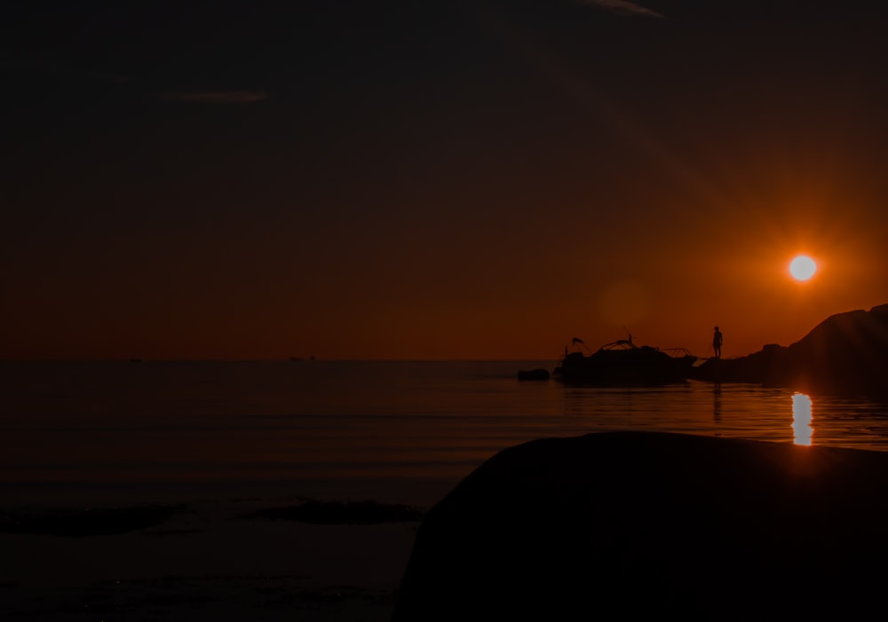 a sunset over a body of water