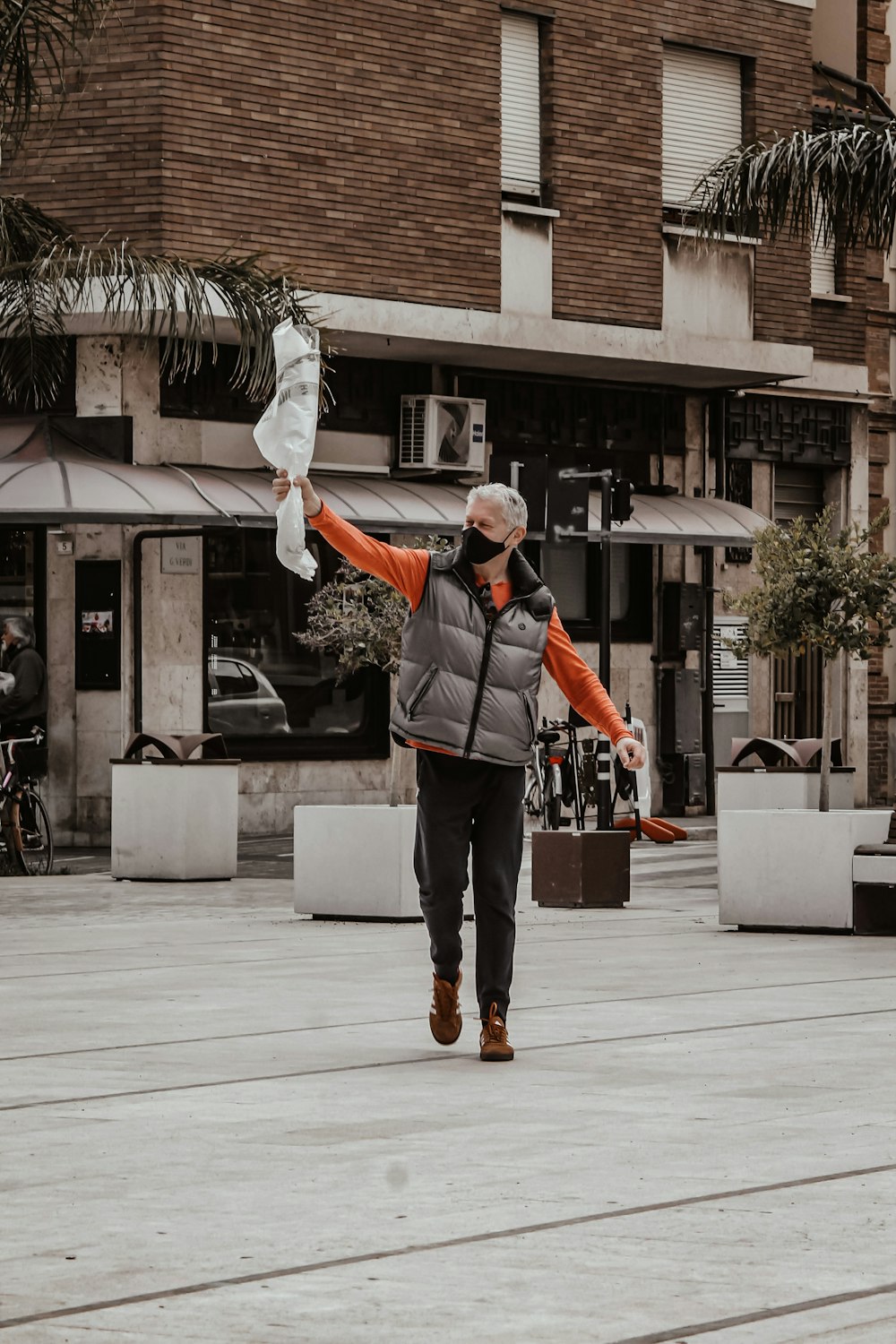 a man carrying a bag