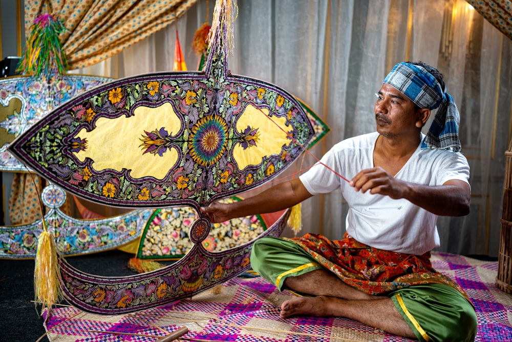 a person sitting on a rug