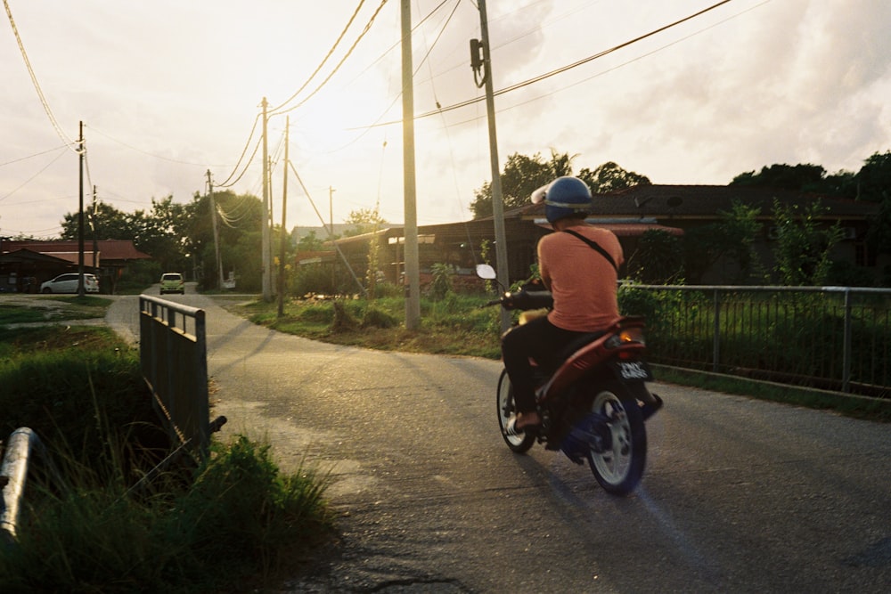 a person riding a motorcycle on a road