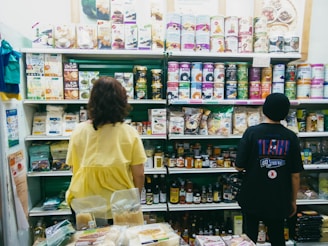 a couple of people in a store