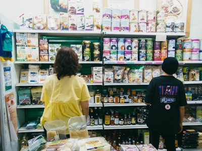 a couple of people in a store