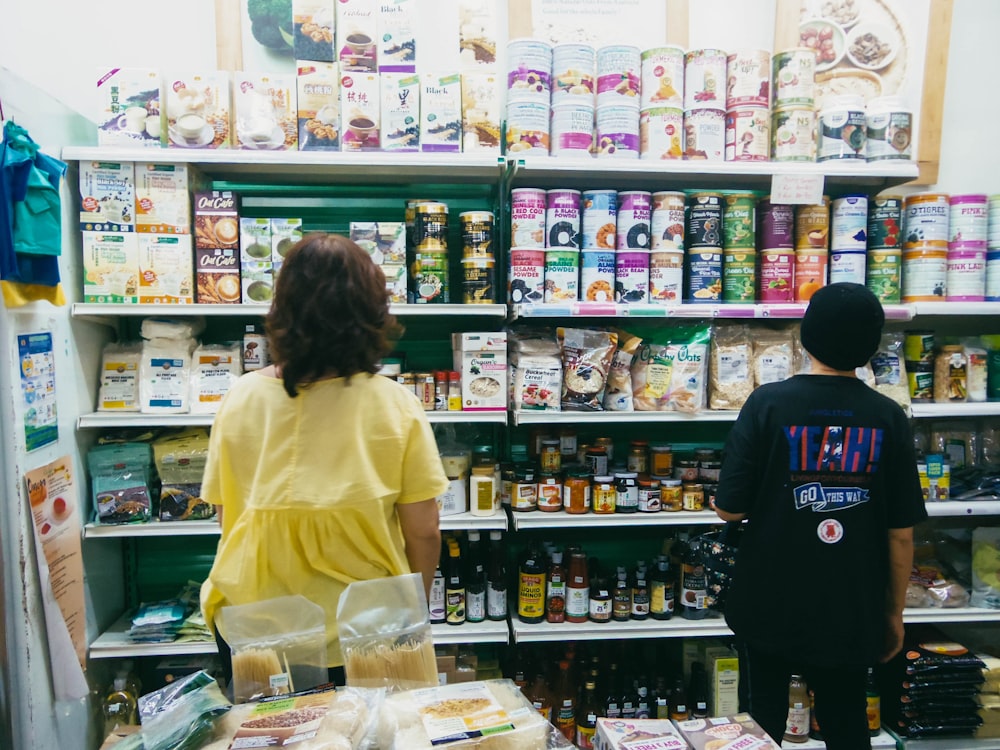 a couple of people in a store