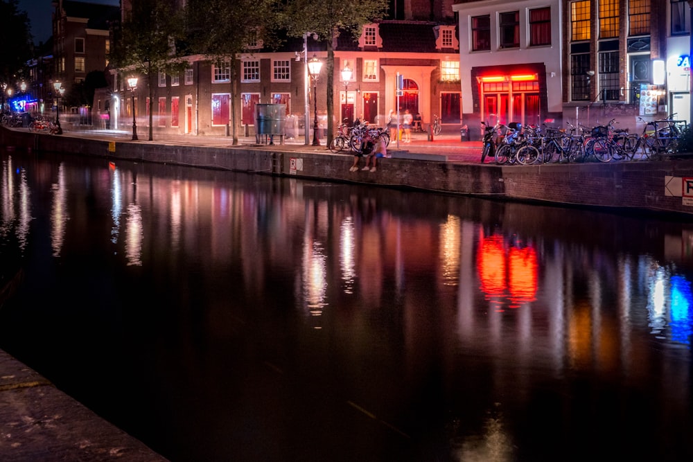 a body of water with buildings around it