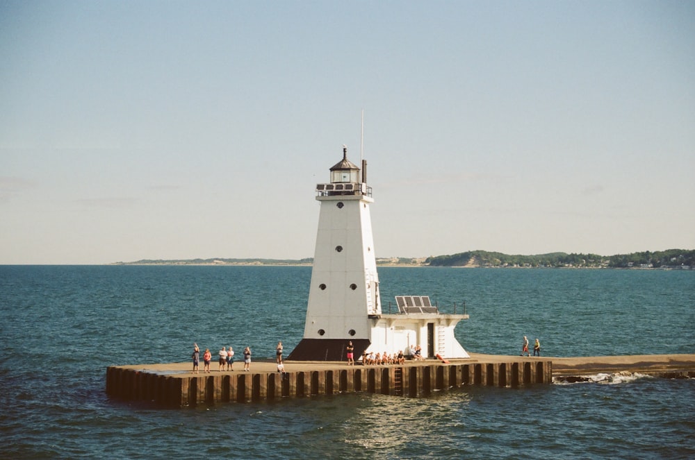 a lighthouse on a pier