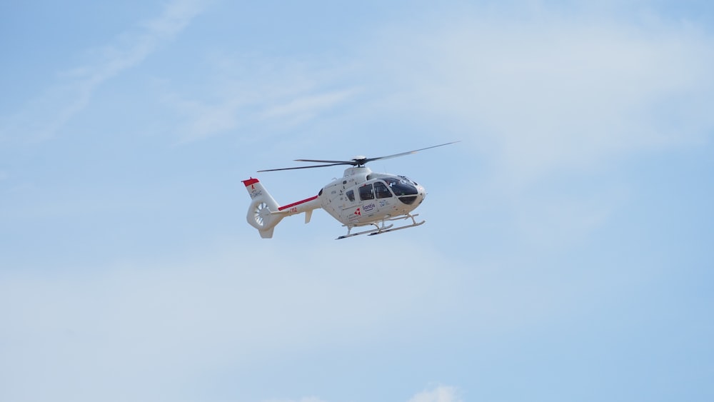 a helicopter flying in the sky