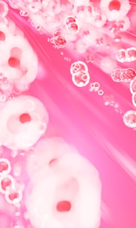 A vibrant pink-themed contact form on a modern online store background.