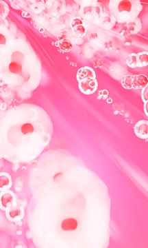 A vibrant screenshot of a playful, pink-themed website homepage in progress.