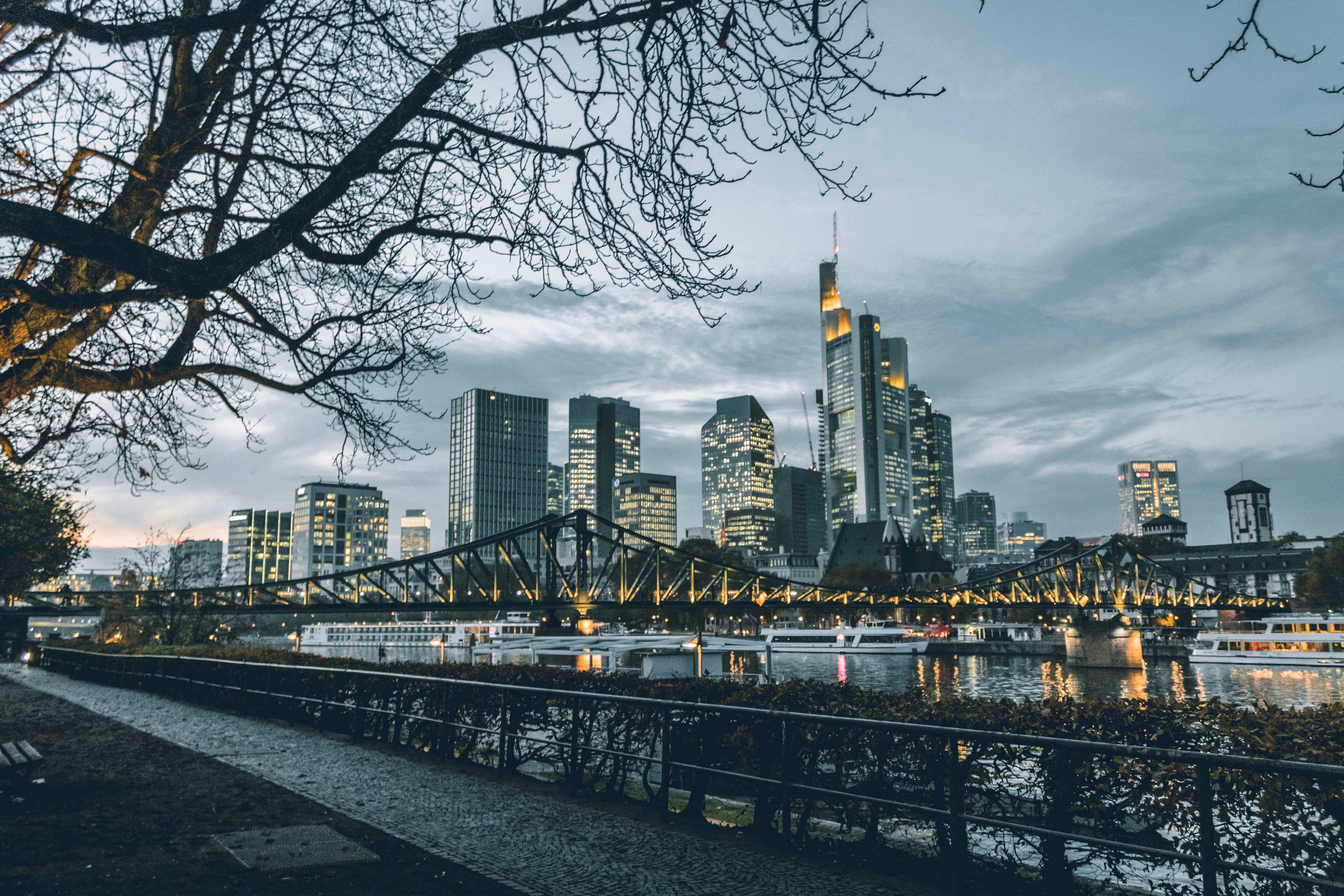 a city skyline with a river