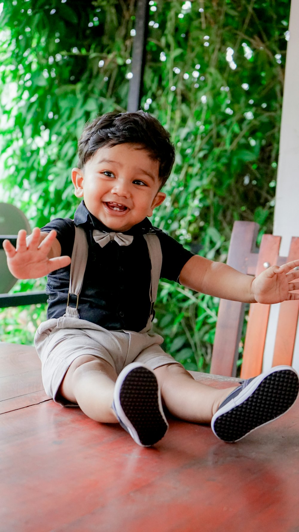 a boy sitting on a chair