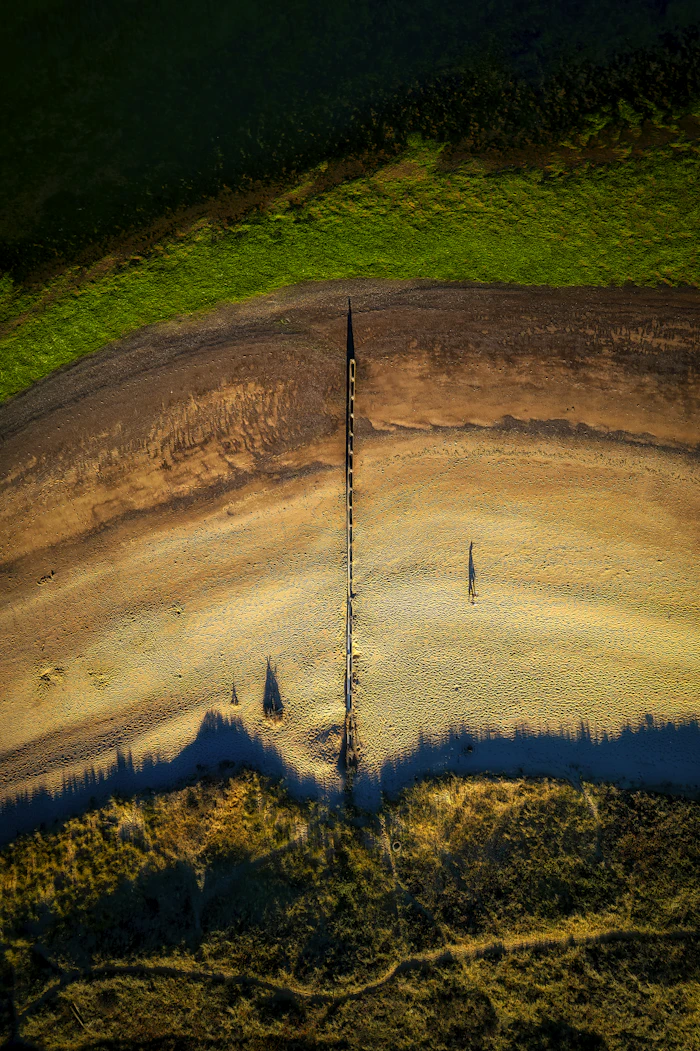 Aerial view over fields and trees at Dawlish Warren, Devon