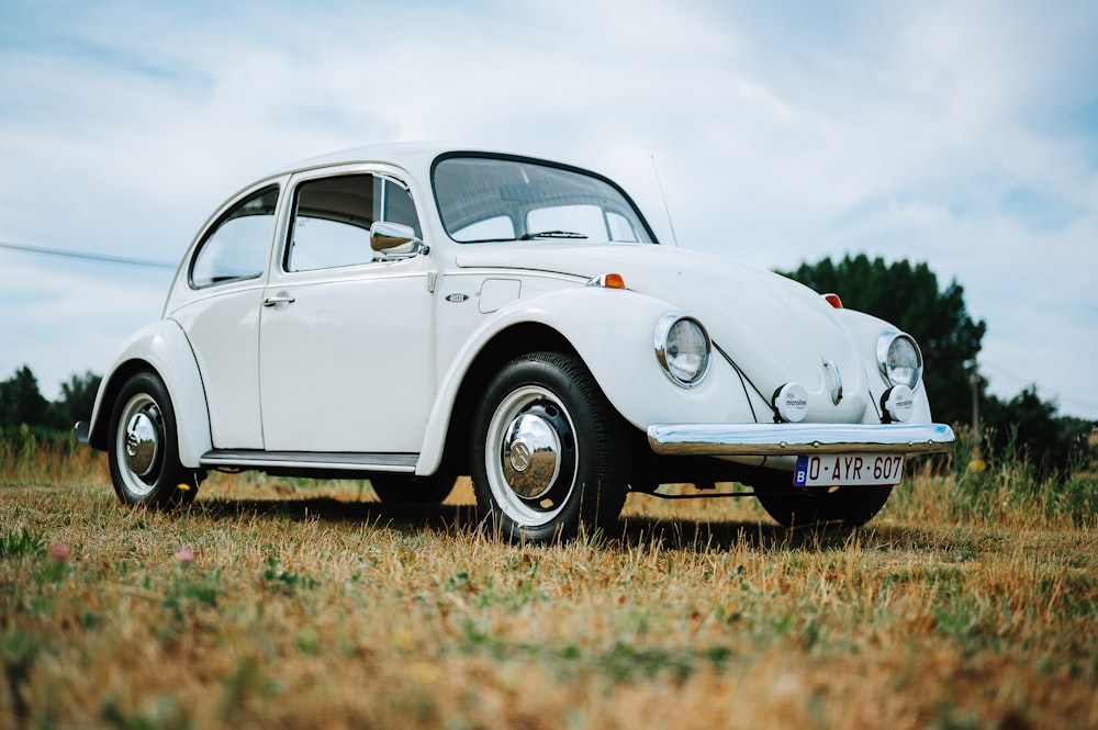 a white car parked in a field