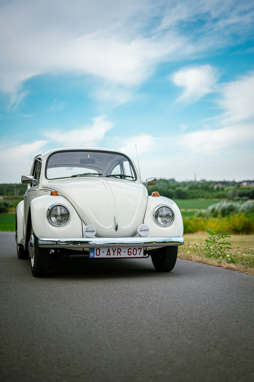 a white car parked on a road