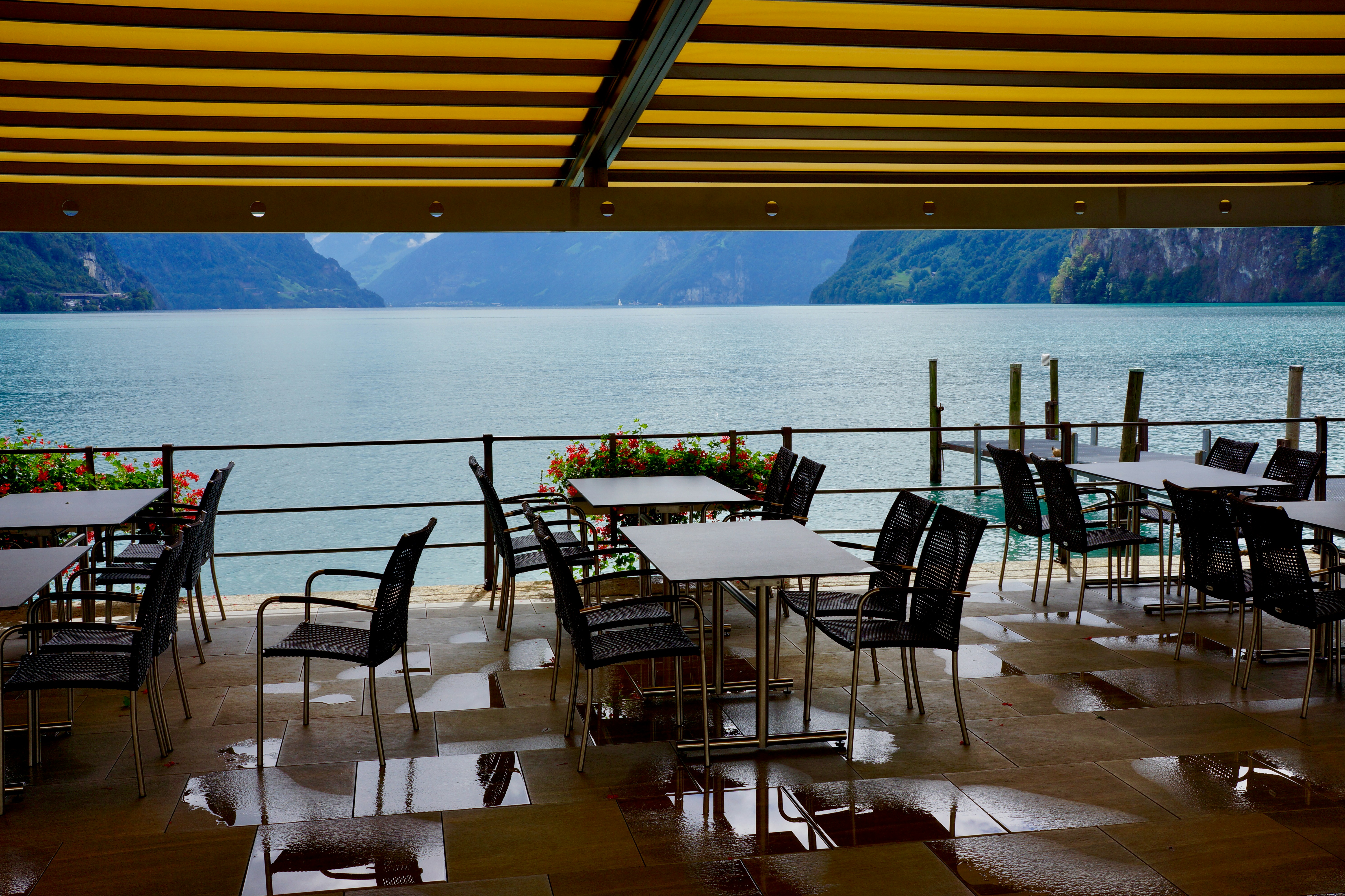 tables and chairs on a deck