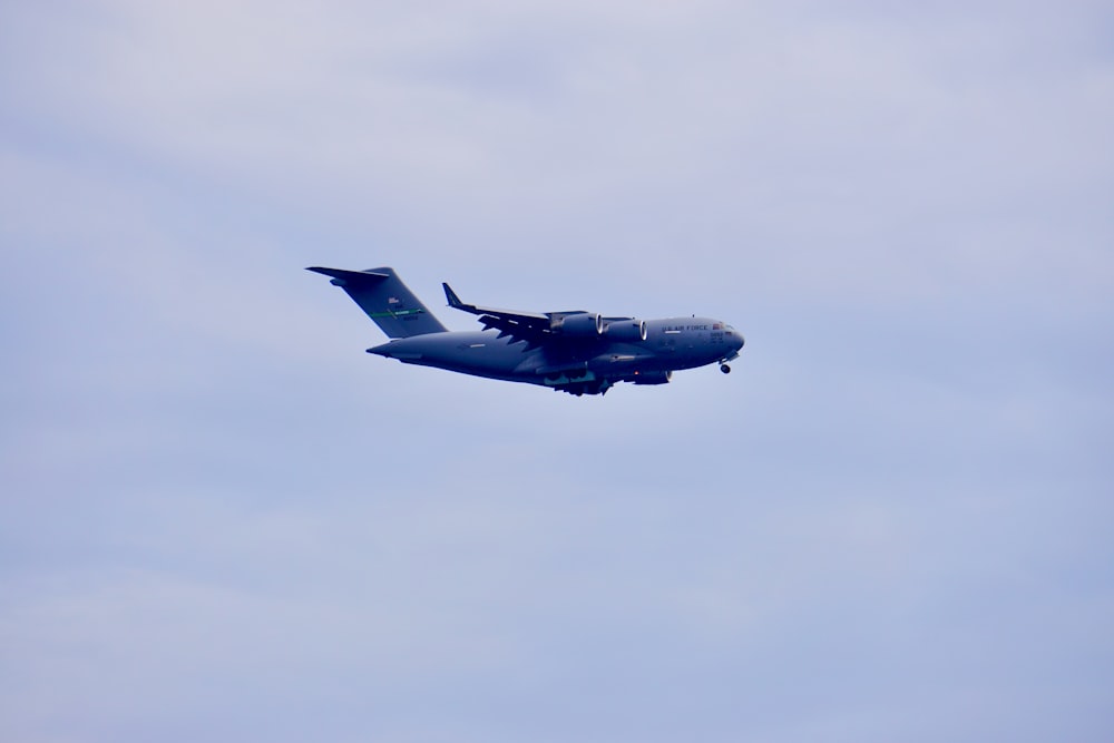 a large airplane flying in the sky