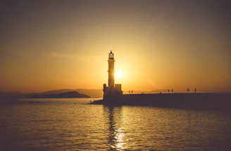 a lighthouse on a pier