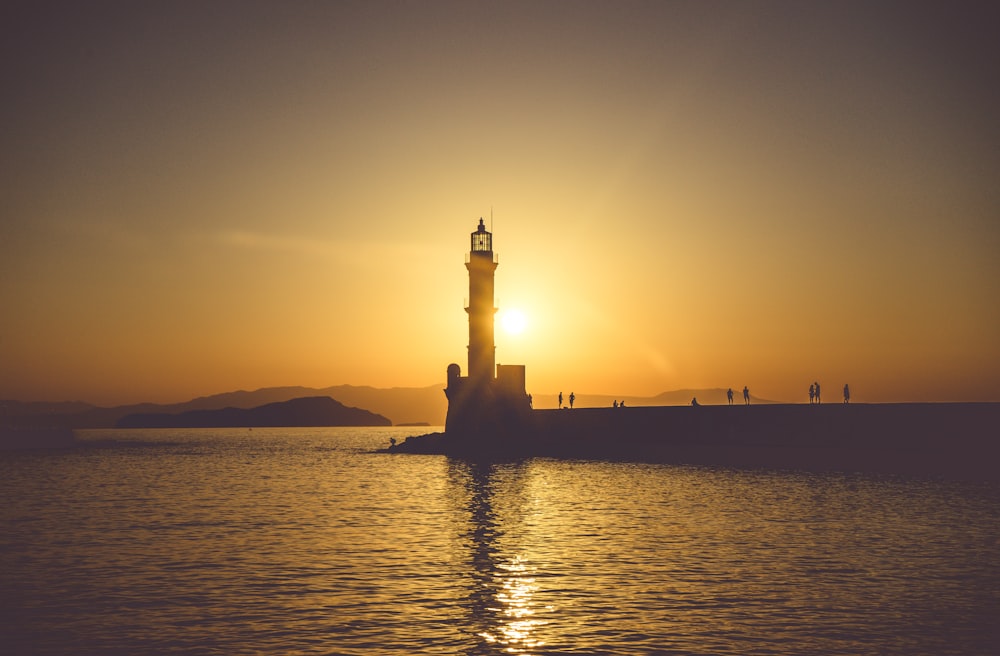 a lighthouse on a pier