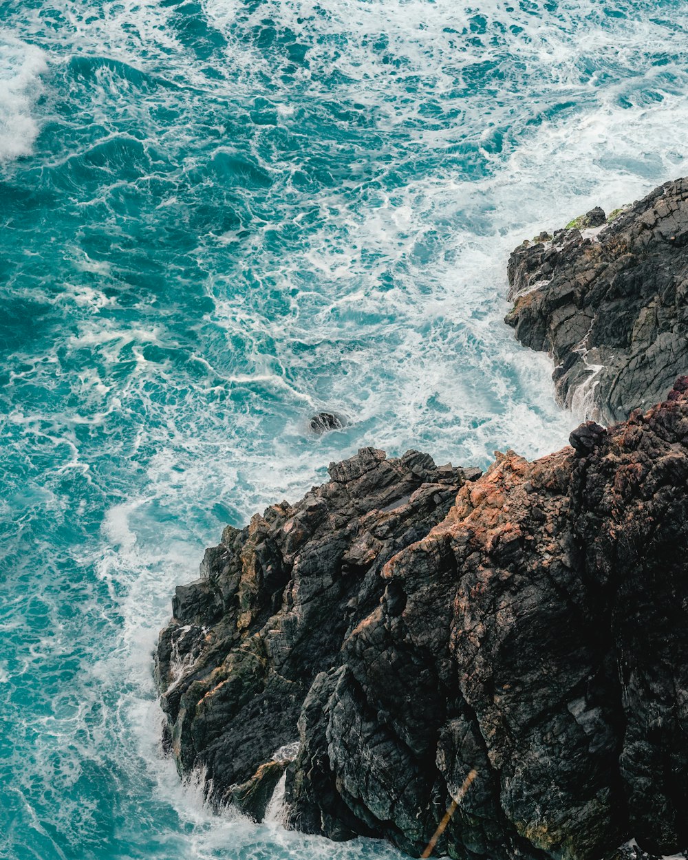 a rocky cliff overlooking the ocean