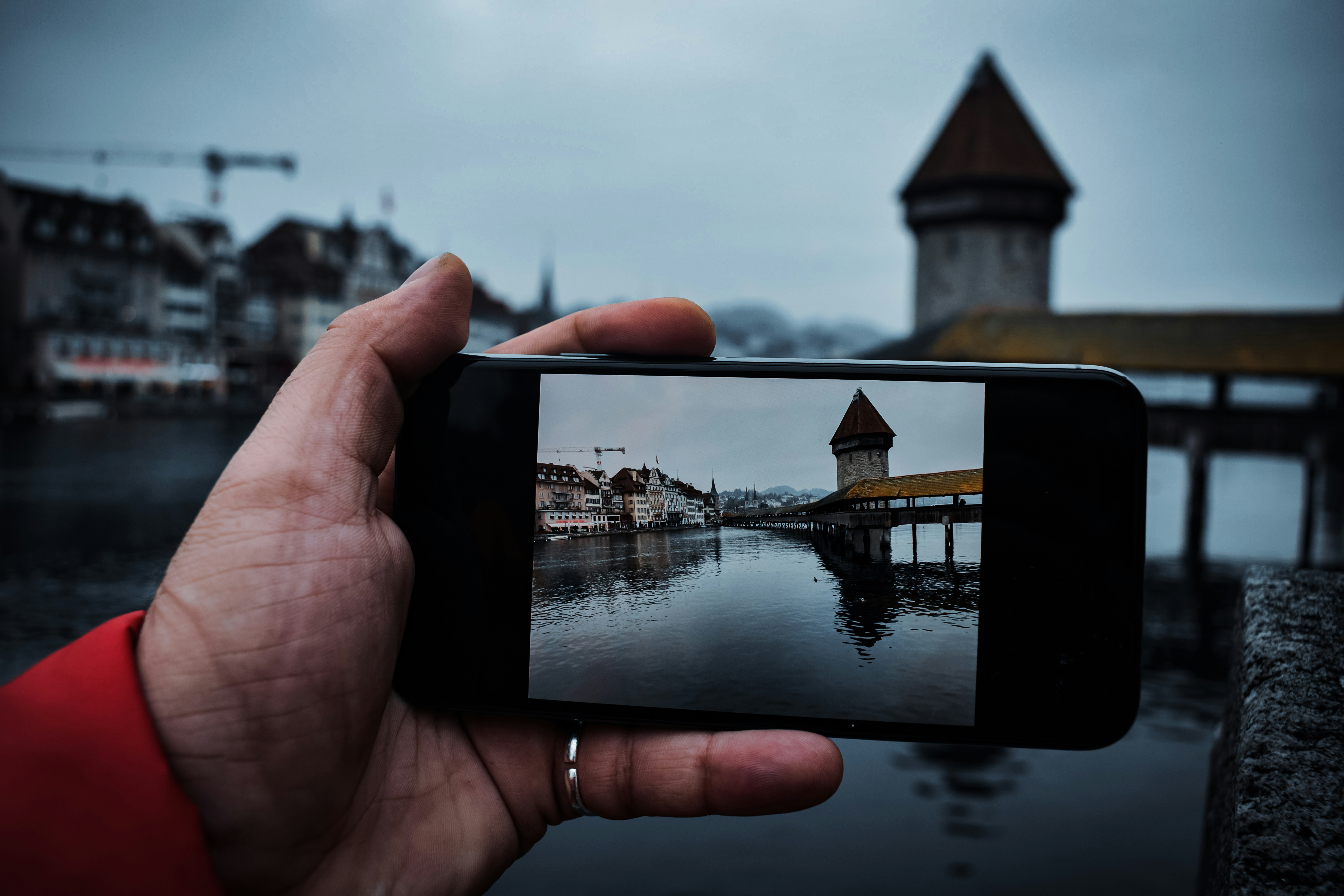 a hand holding a phone