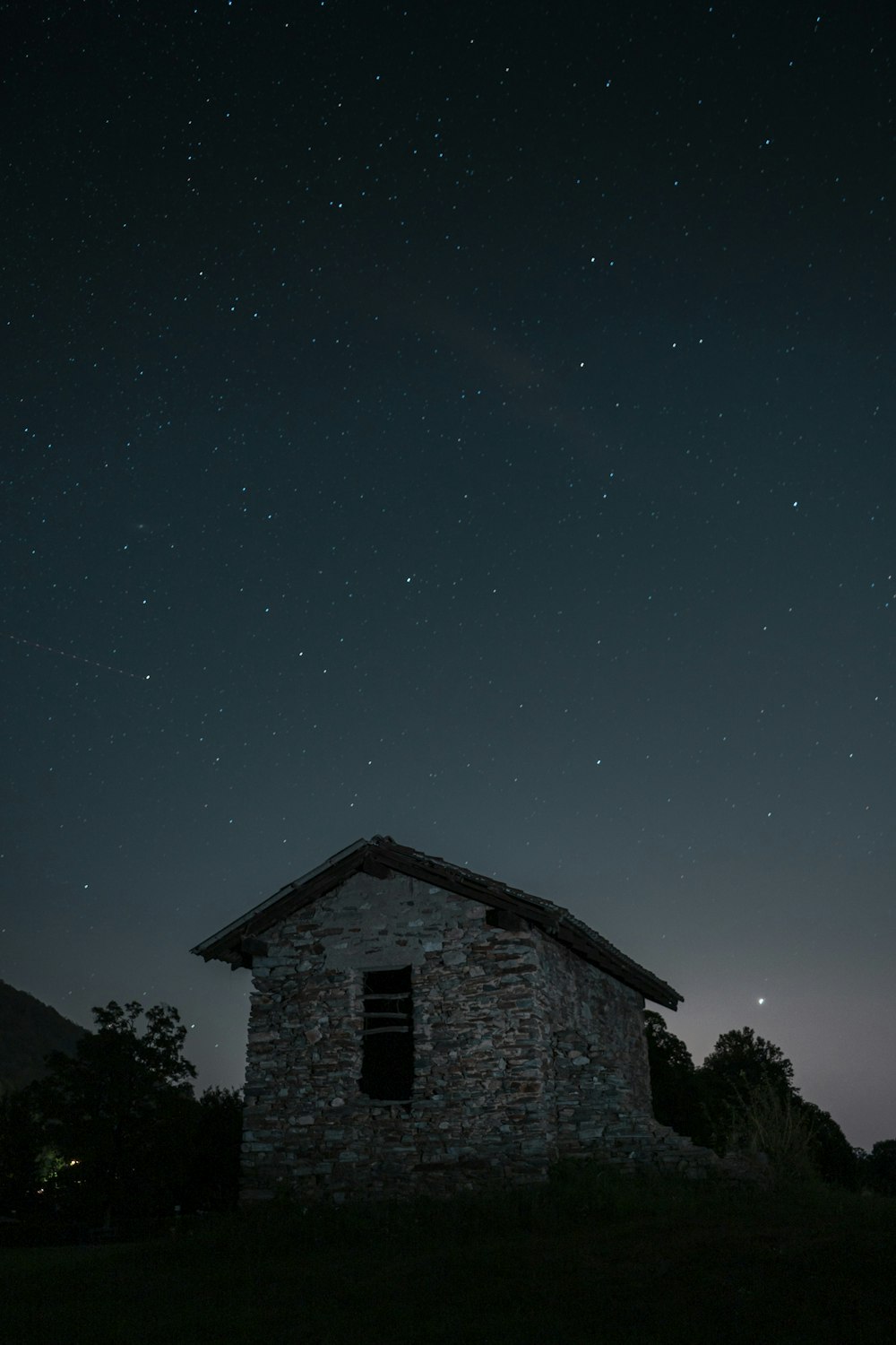 a building with a starry sky above it