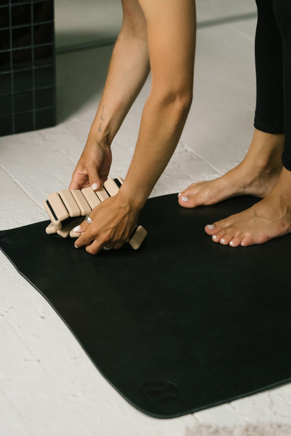 a pair of feet with sandals