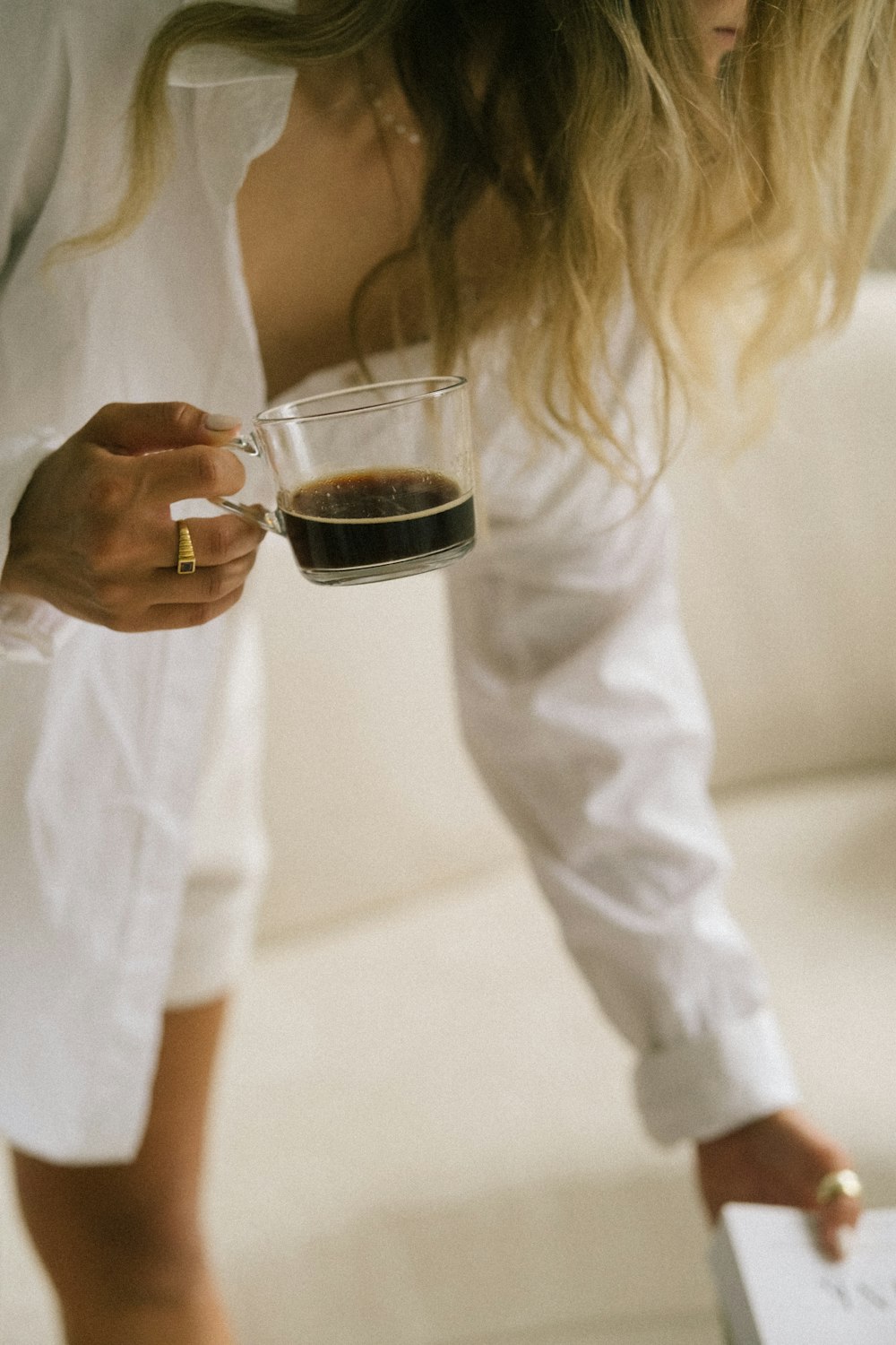 a person holding a glass of wine