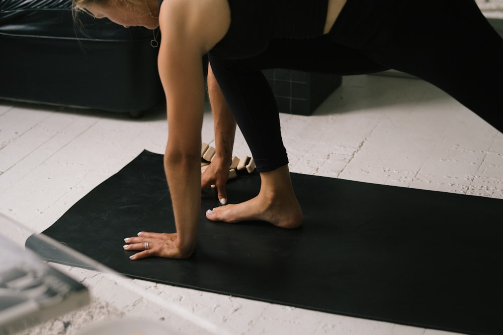 a pair of feet on a black surface