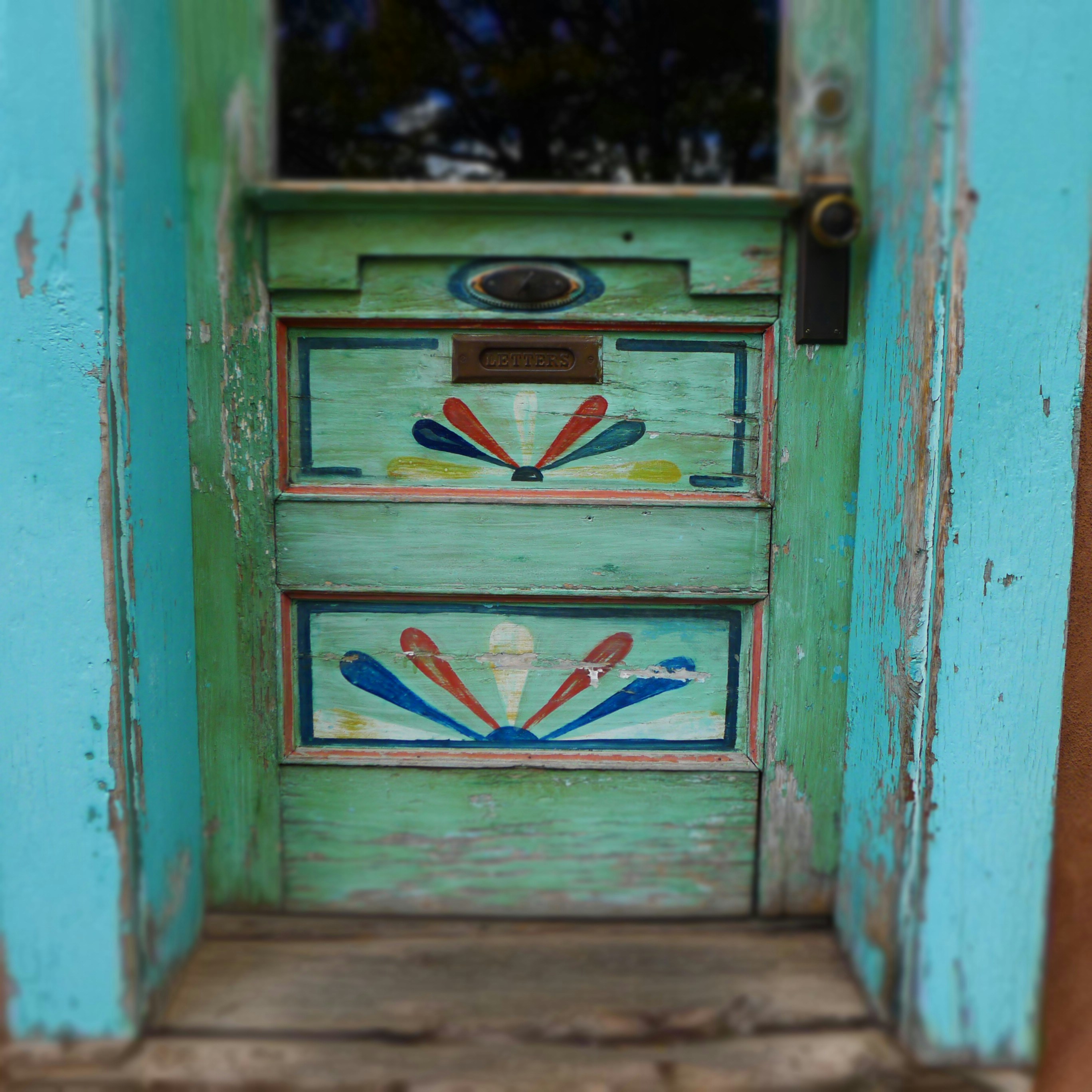 a green door with a blue door