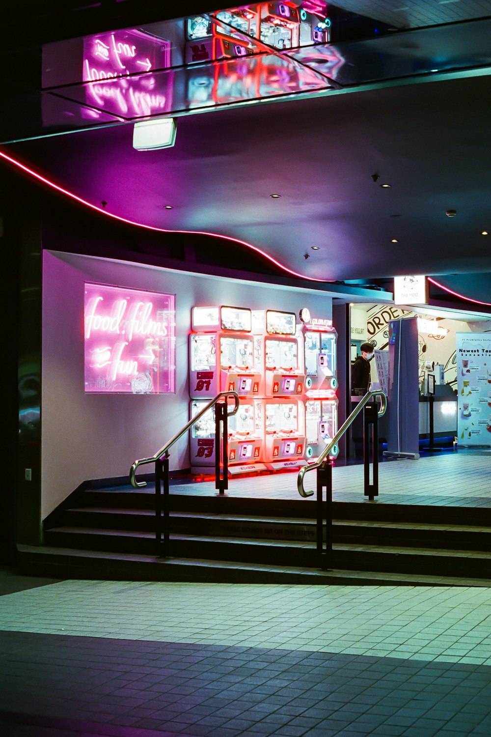 a building with neon signs