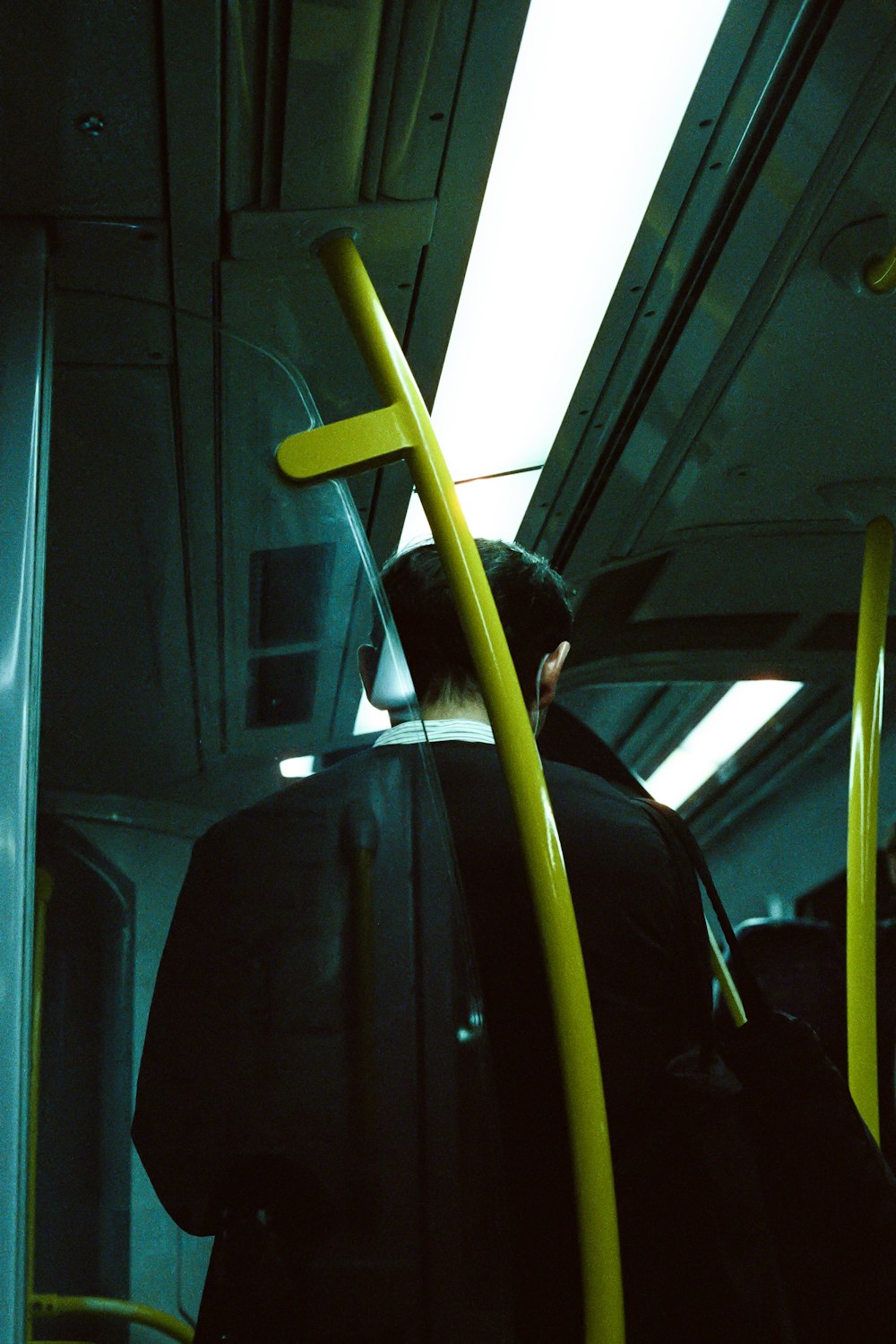 a person sitting on a bus