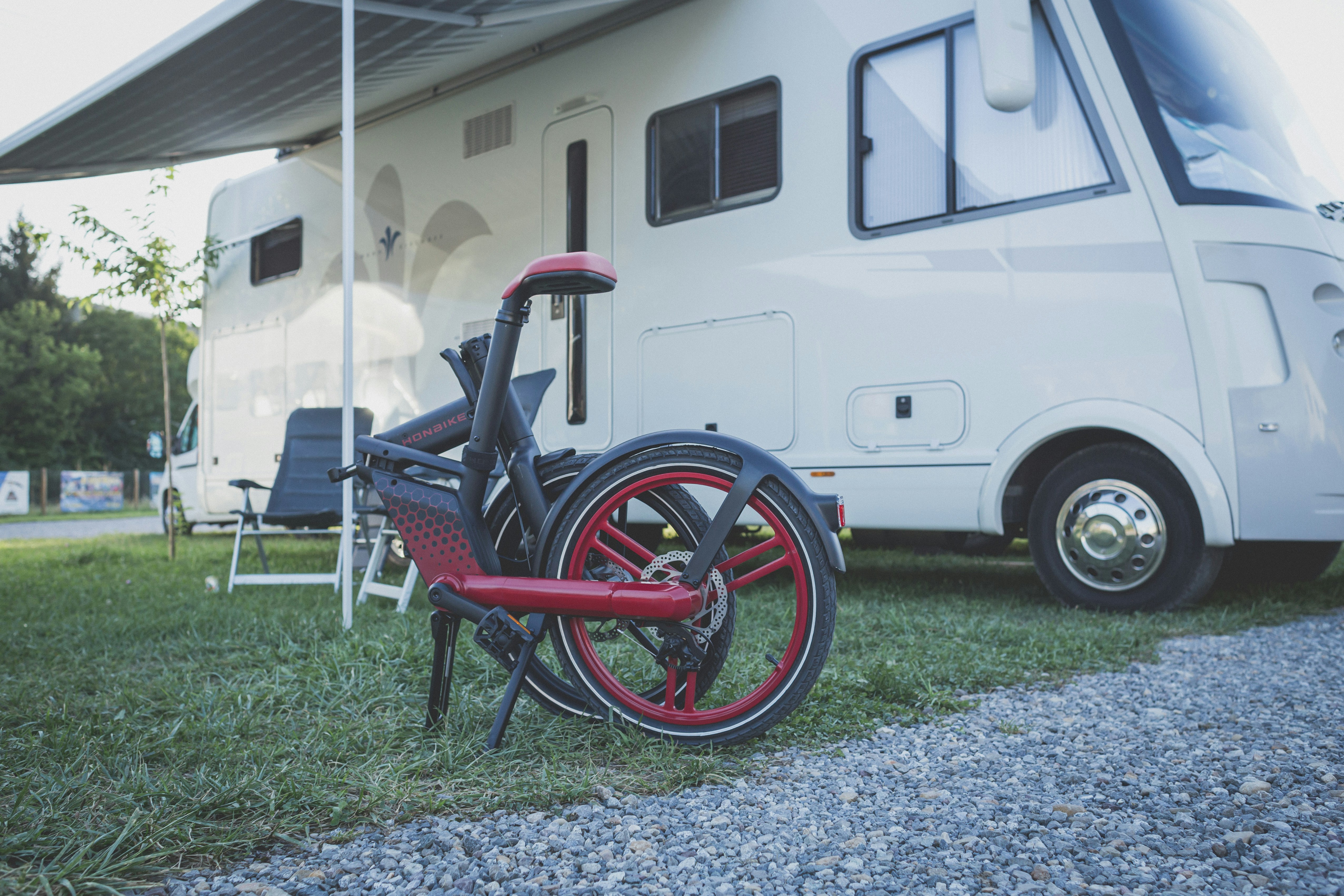 a bicycle parked in front of a white van