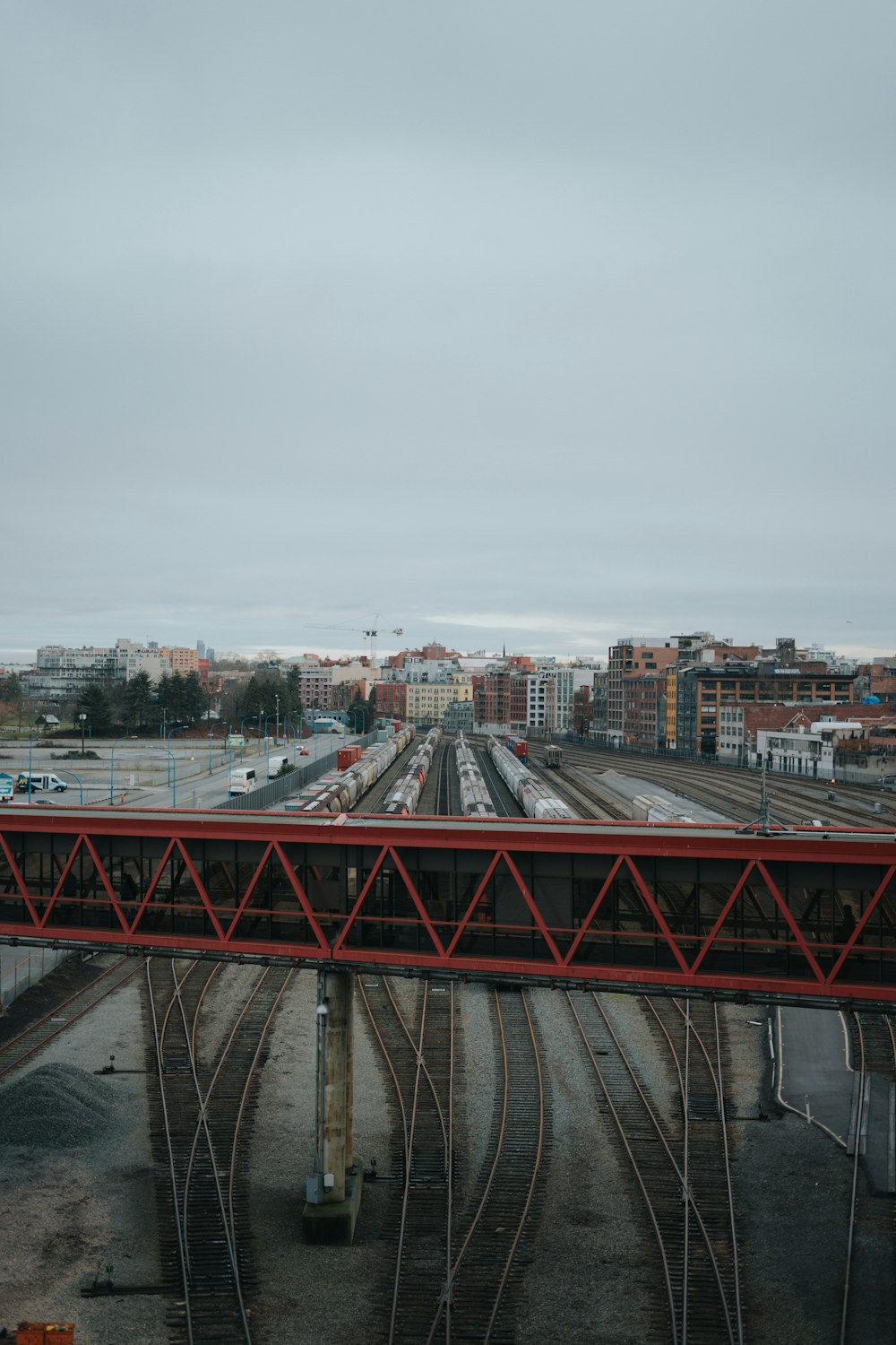 a train track with a city in the background