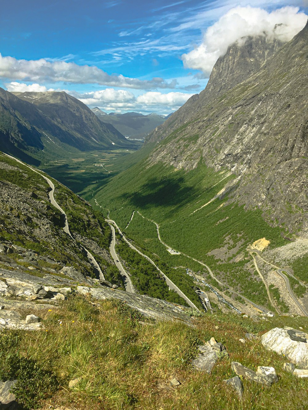 a winding road through a valley