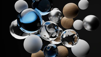 Floating 3D spheres casting gentle reflections on a blurred glass panel with a deep black-to-violet gradient backdrop