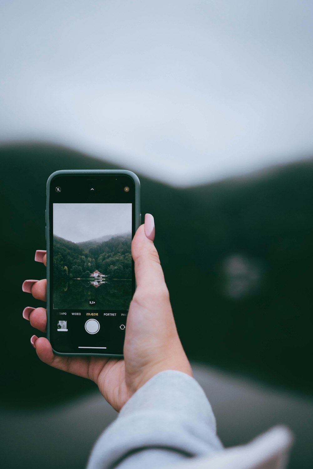 a person holding a cell phone