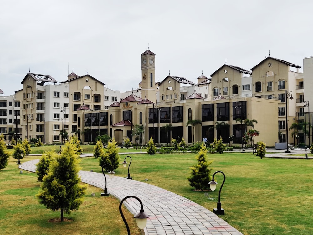 a large building with a lawn in front of it