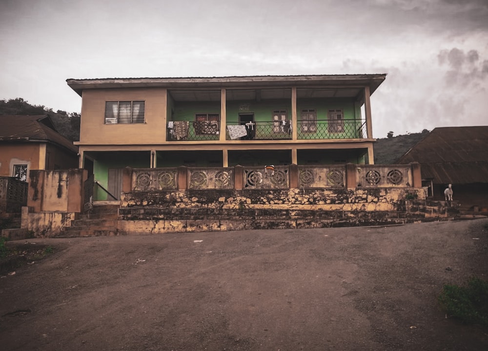 a house with a stone wall