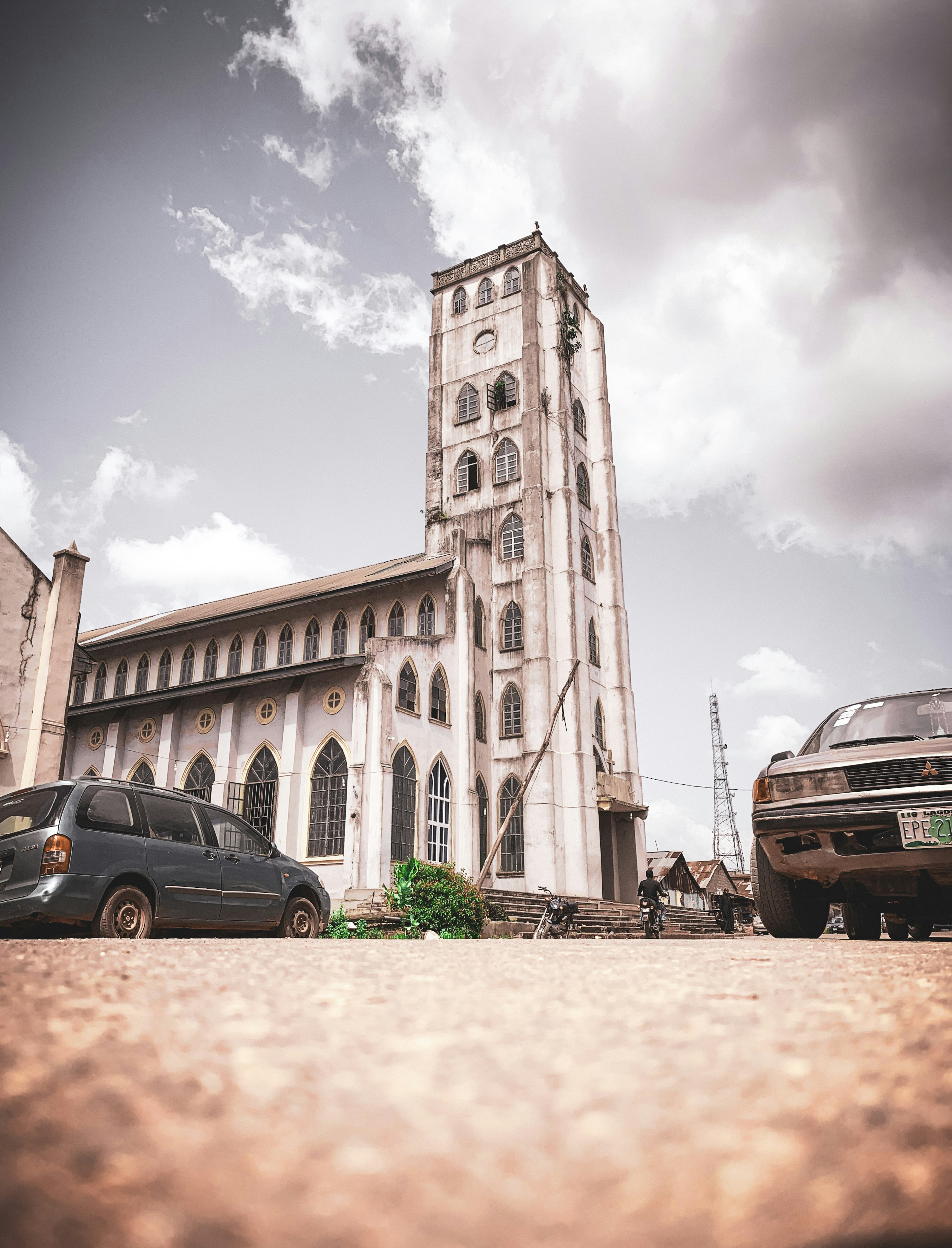 a large white building with a tower
