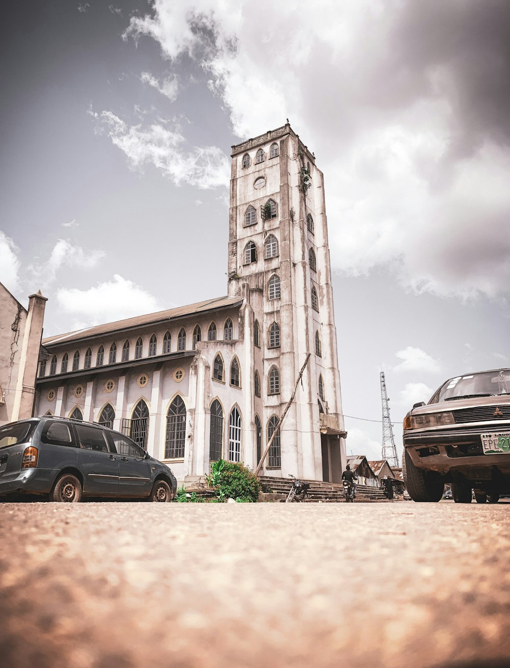 a large white building with a tower