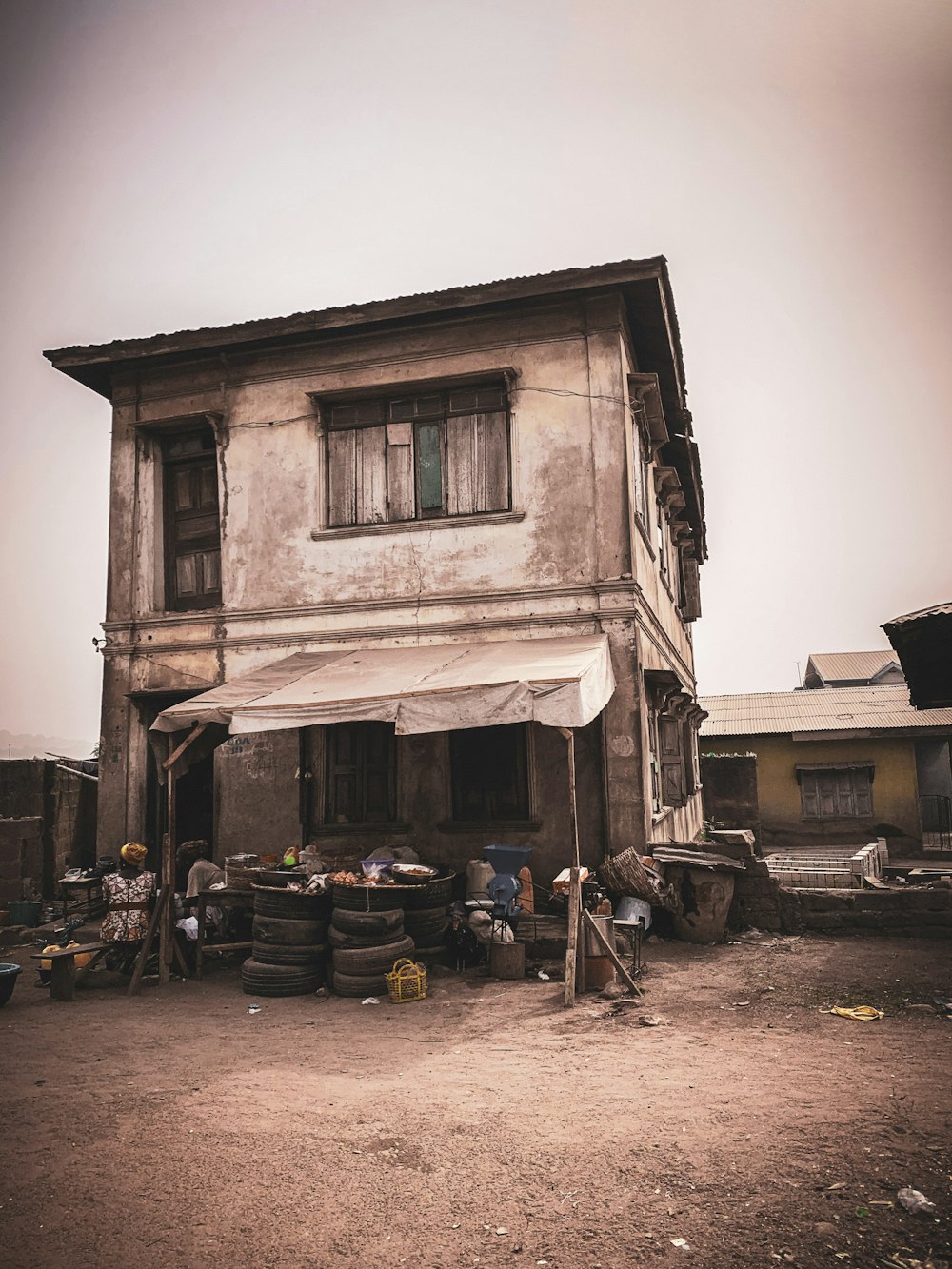 a house with a lot of tires in front of it