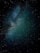A starry sky with a dense cluster of stars forming a bright region against a dark celestial backdrop. The stars vary in size and brightness, scattered across a deep, dark expanse.